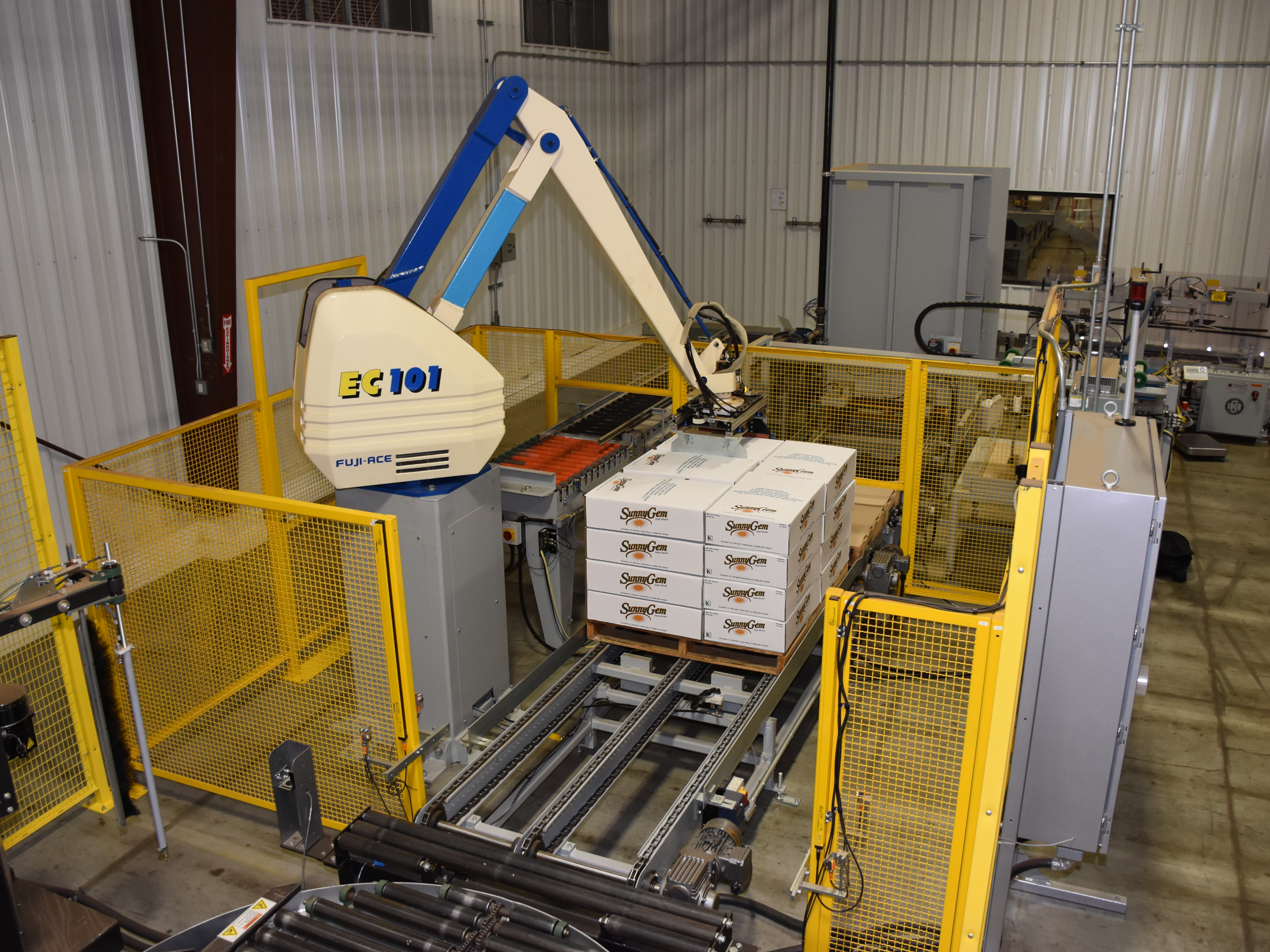 Lube oil bucket palletizing in Ahmedaba